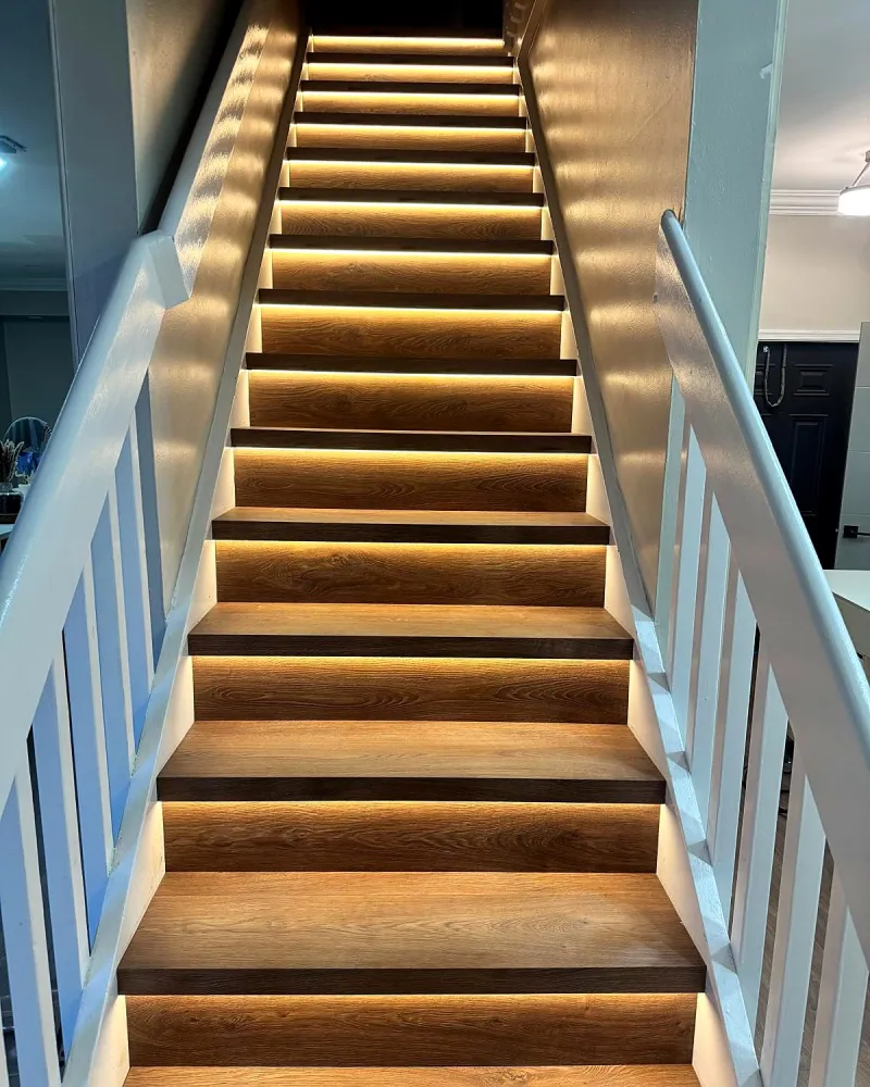 Refinished staircase with new treads and rail, Miami home renovation