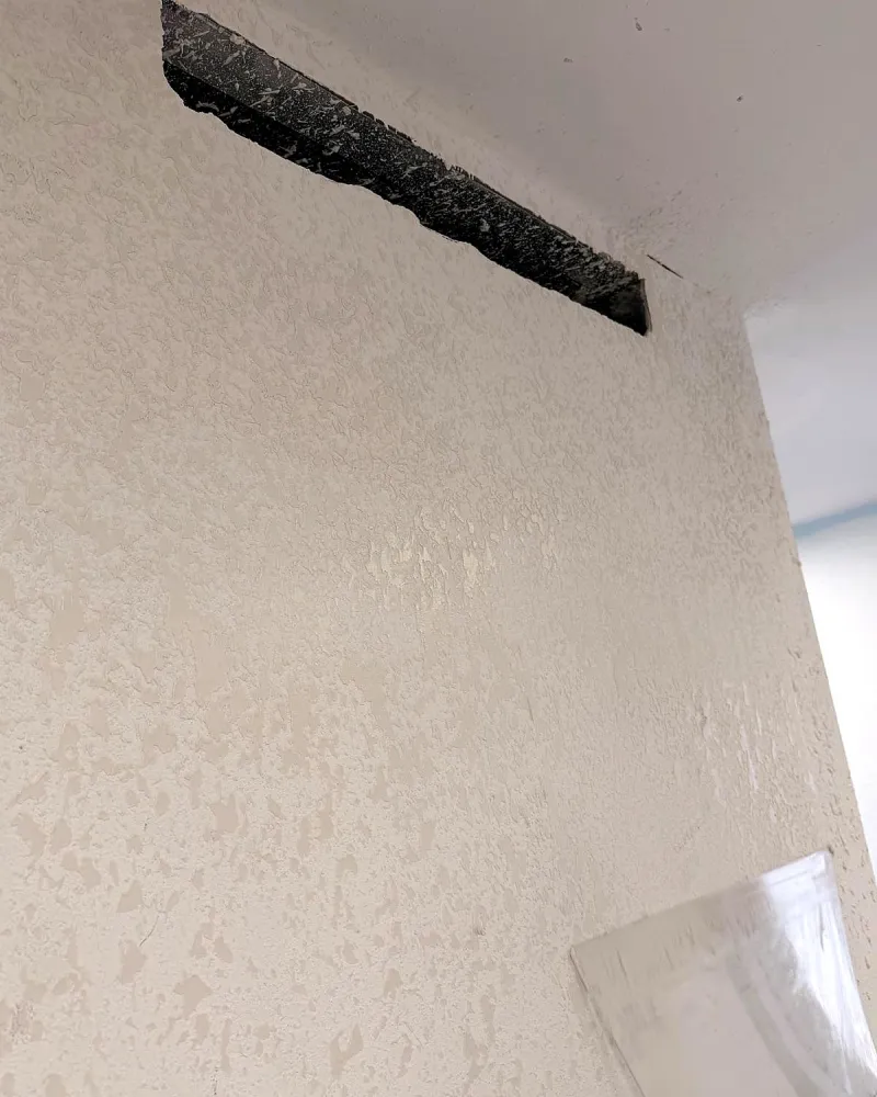 Popcorn ceiling texture before removal in a Miami home